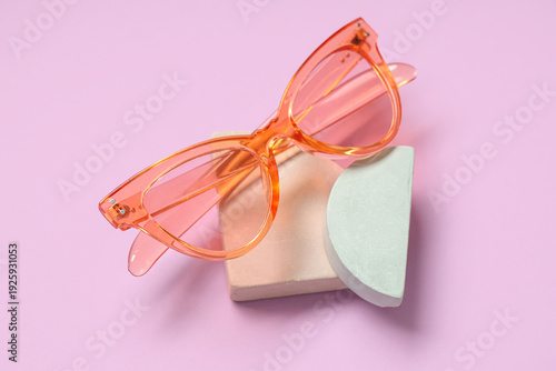Stylish pink sunglasses and...