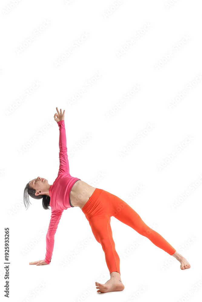 Obraz premium Sporty young woman doing yoga on white background