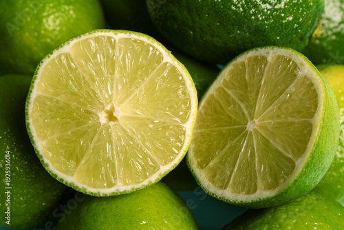 Texture of fresh limes as background, closeup