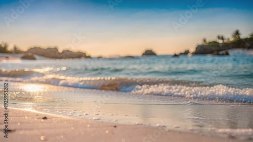 Sunny serene beach with turquoise water, soft sand, gentle ocean waves, peaceful sunrise, tranquil sea, summer vacation atmosphere