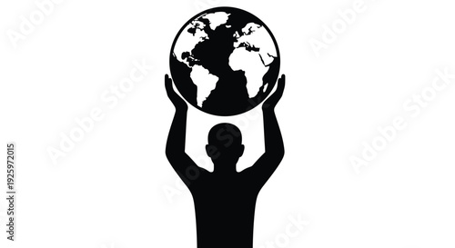 Silhouette of person holding the entire world globe above their head in victory