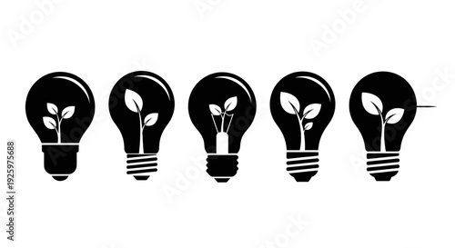Light bulbs each containing a growing plant symbolize the concepts of innovation, sustainability, and renewable energy.