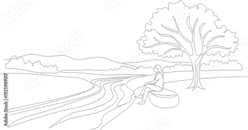 Man sitting under tree near river