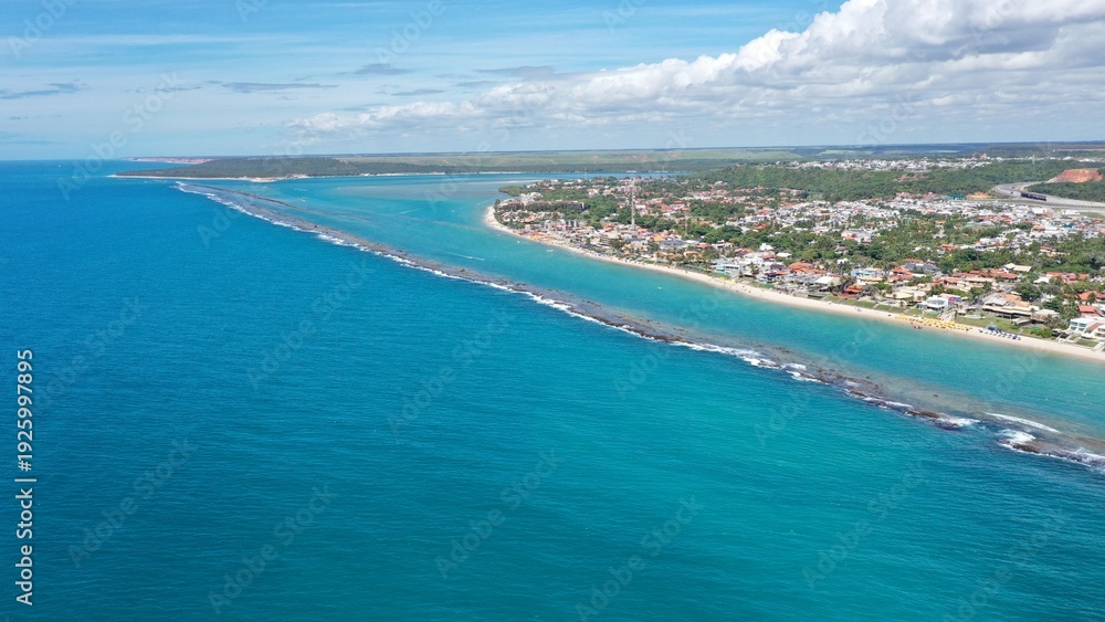 Fototapeta premium Fantastic aerial view of Barra de Sao Miguel beach on a sunny summer day in February 2026 near Maceio City. Alagoas State, Brazil 