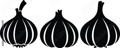 Set of three black garlic bulb silhouettes isolated on white background for organic cooking healthy eating fresh vegetable market and spicy seasoning food menu design