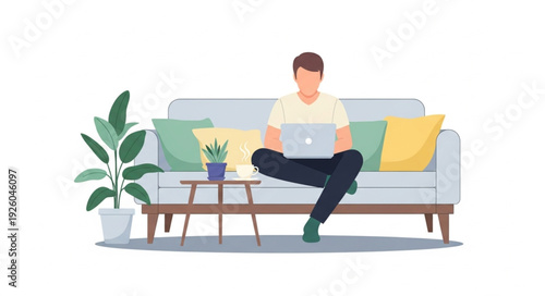 Man working on laptop computer while sitting on sofa at home.