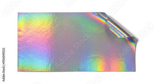 Iridescent foil sheet with rainbow-colored reflective surface and curled corner