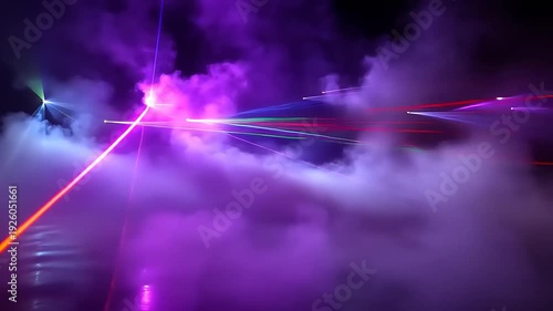 Vibrant Purple Laser Beams in Smoky Atmosphere.