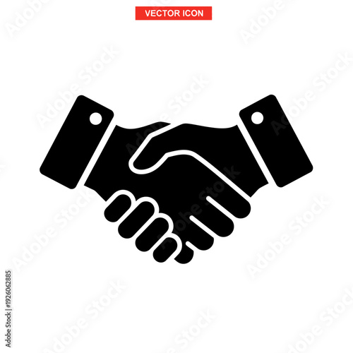 A handshake between two people in black