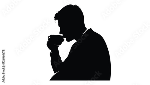 Striking black silhouette of a businessman taking a thoughtful sip from a small cup during a brief moment of reflection