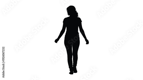 Silhouette of a young woman with her hair tied back walking forward against a stark white background isolated image