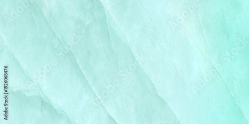 a close up of a marble surface with white and light streaks throughout the stone