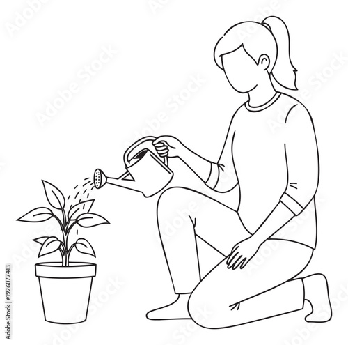 Young woman kneeling on the ground caring for a vibrant green houseplant by watering it from a small can, ideal for depicting horticultural activities and home garden care concepts.