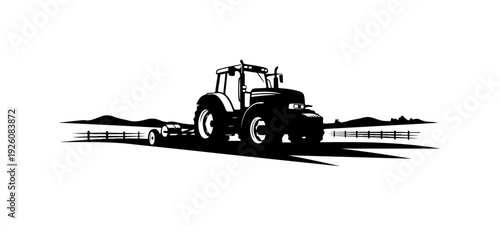 Tractor working in farm field with trailer attached