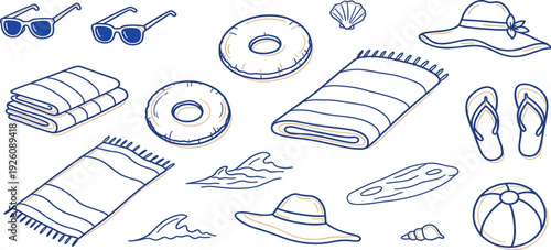Collection of beach accessories and summer items arranged neatly for a relaxing seaside vacation