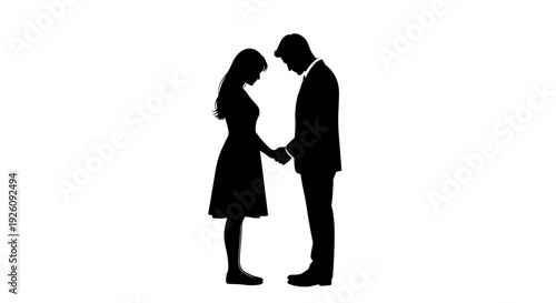 Silhouetted couple holding hands a man in a suit and a woman in a dress standing together in a moment of quiet intimacy