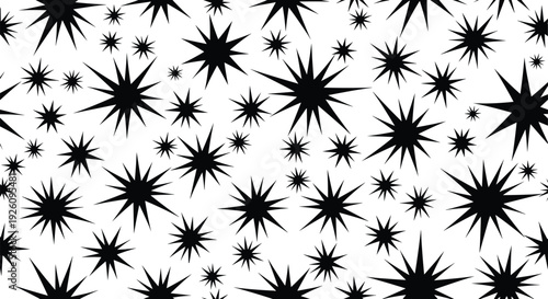 Seamless monochrome pattern of sharp black starbursts and stars of various sizes scattered randomly on a solid white background.