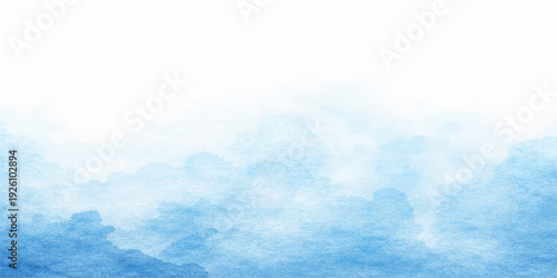 A beautiful summer day features a clear blue sky and white clouds where bright sunlight fills the atmosphere to create a high-contrast nature landscape and cloudy abstract beauty