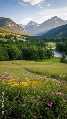 Lush Green Valley with Wildflowers and Majestic Mountains Under a Bright Sky.