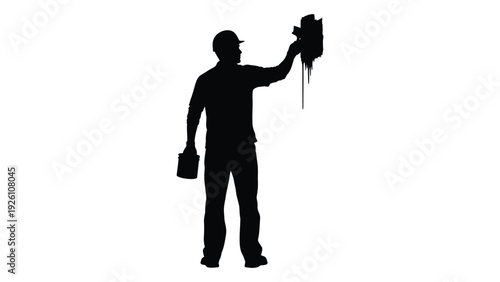 Silhouette of a man pouring liquid from a container holding a bucket