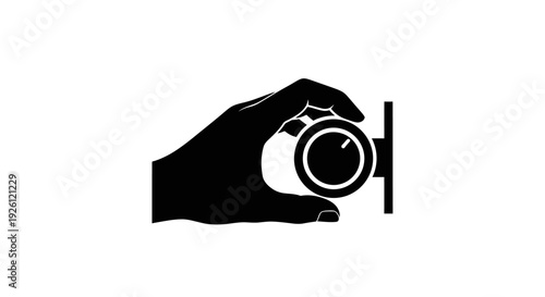 Hand holding a camera lens in a minimalist design.
