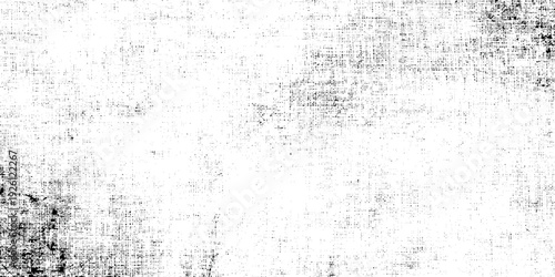 Abstract grunge and grainy old stained speckled texture are surrounding randomly on white background.