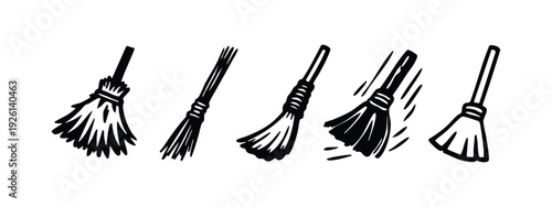 Hand-drawn broom icons set depicting various styles and forms, some showing sweeping motion.