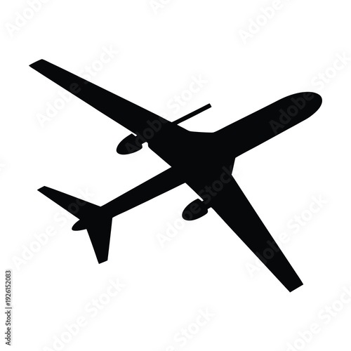 Silhouette of commercial airplane with contrails, seen from below and to the side