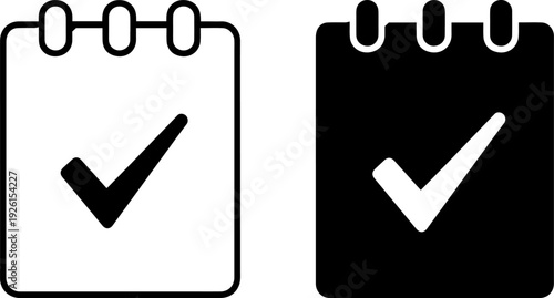 Checkmarks on notepads for task completion and organization