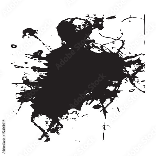 Abstract black ink blot with splatters and drips on a white background.