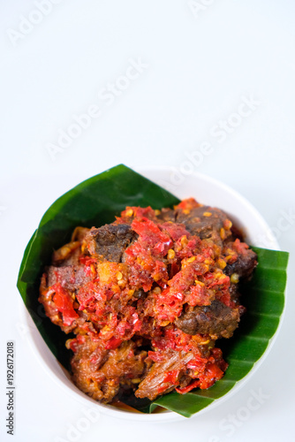 Wallpaper Mural Dendeng balado is a traditional cuisine from West Sumatera, Indonesia. It is made from slice of beef with spicy sauce called sambal. Isolated on white background Torontodigital.ca