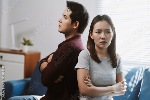 Photos Angry couple turning their backs on each other at home, experiencing relationshi