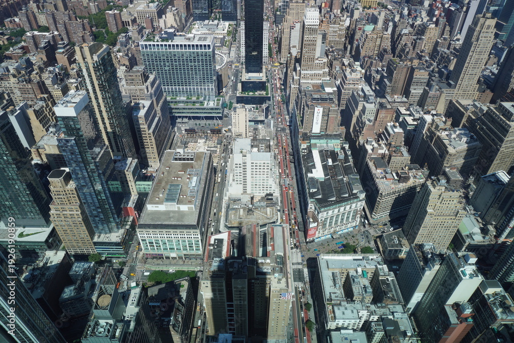 Fototapeta premium Top down aerial view of Midtown Manhattan city blocks