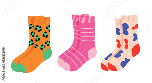 Collection of three pairs of colorful and stylish casual socks with different fun patterns like leopard print and abstract shapes.