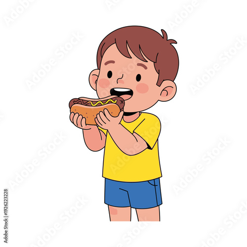 Happy boy eating a hot dog with mustard, isolated on white background