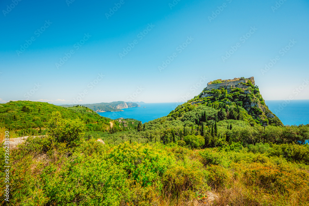 Obraz premium Medieval fortified castle of Aggelokastro with amazing views to Paleokastritsa bay on the Greek island of Corfu