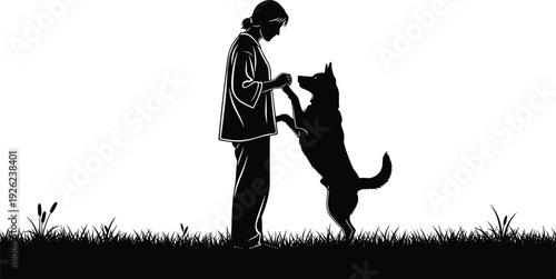 Black silhouette of woman training her dog in a grassy field, female pet owner playing with puppy, outdoor animal friendship and companionship