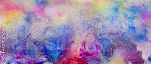 vibrant frozen spring flower abstraction background with hyacinth, delphinium and orchid