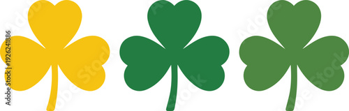 This image displays three shamrocks aligned horizontally, each in a different color: gold, dark green, and a lighter green. The shamrock is a well-known symbol of Ireland, often associated with St. Pa