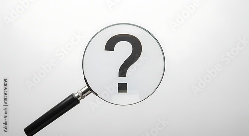 Magnifying glass with question mark on paper behind it, symbolizing search for answers and problem solving. Clean minimal composition for research, inquiry, and investigation concept.