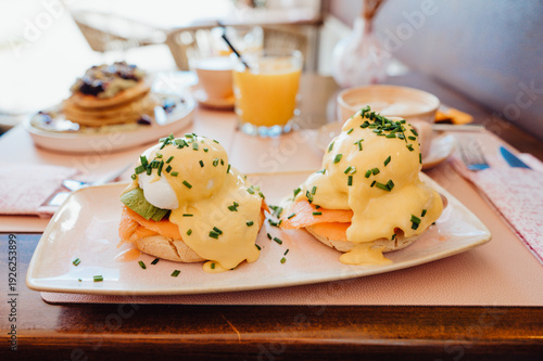 Wallpaper Mural Eggs Benedict with smoked salmon and hollandaise sauce in café Torontodigital.ca