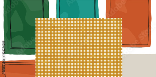 Assorted colorful patterns and designs displayed on a tabletop viewed from directly above in a creative workspace