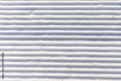 Tableau sur toile Snow groomed by a snowcat on a ski slope