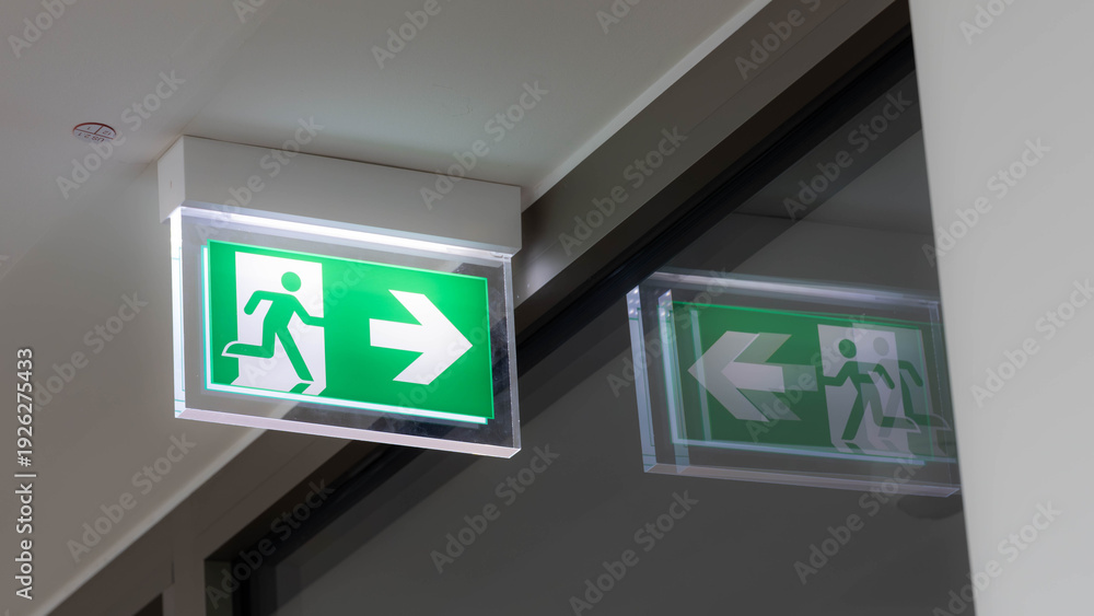 Fototapeta premium - High Quality An Emergency Sign - Shows the way to Safety