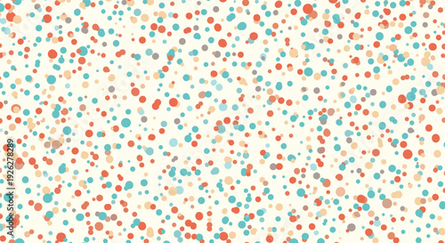 Playful abstract background covered in many small colorful dots of various sizes in shades of red, orange, blue, and gray on a cream surface.