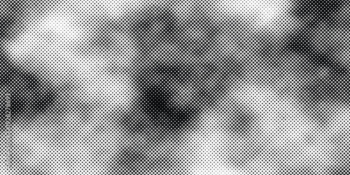 Grunge halftone gradient texture. Vanishing weathered grit noise texture. Black and white sand wallpaper