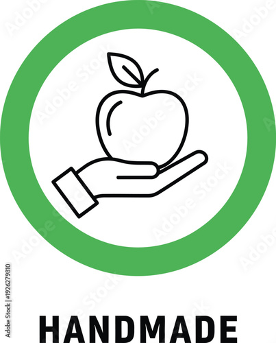 Handmade product label icon featuring a hand holding an apple inside a green circular frame