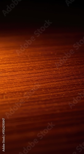 Detailed macro shot of a smooth, polished cherry wood surface, highlighting the rich natural grain pattern and warm reddish-brown color ,furniture ,pattern ,lumber