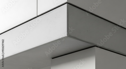 A close-up view of a modern building's exterior corner with clean lines