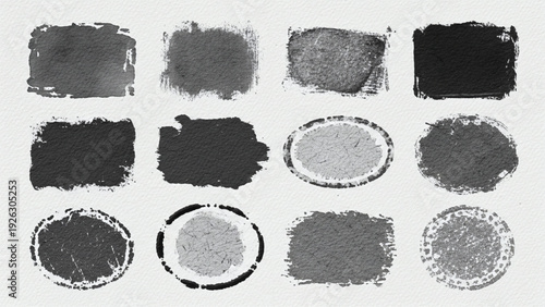 Collection of black and gray brush strokes and circles on white background.